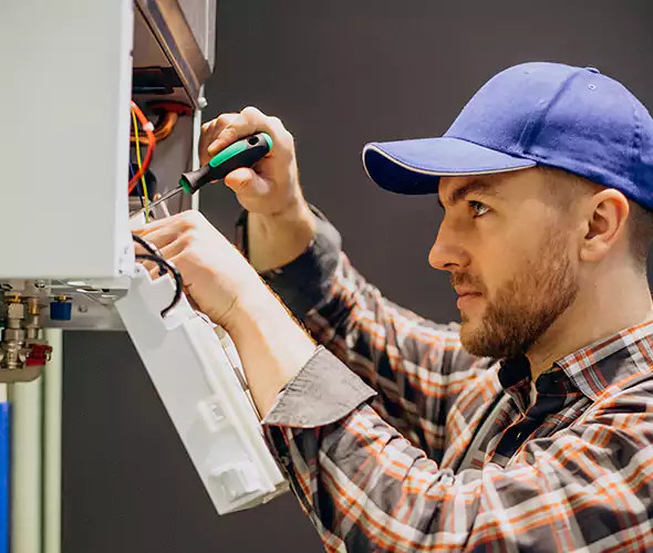 Expert Plumber for Tankless Water Heater Maintenance in Burton, MI: Schedule Professional Maintenance Services with Us